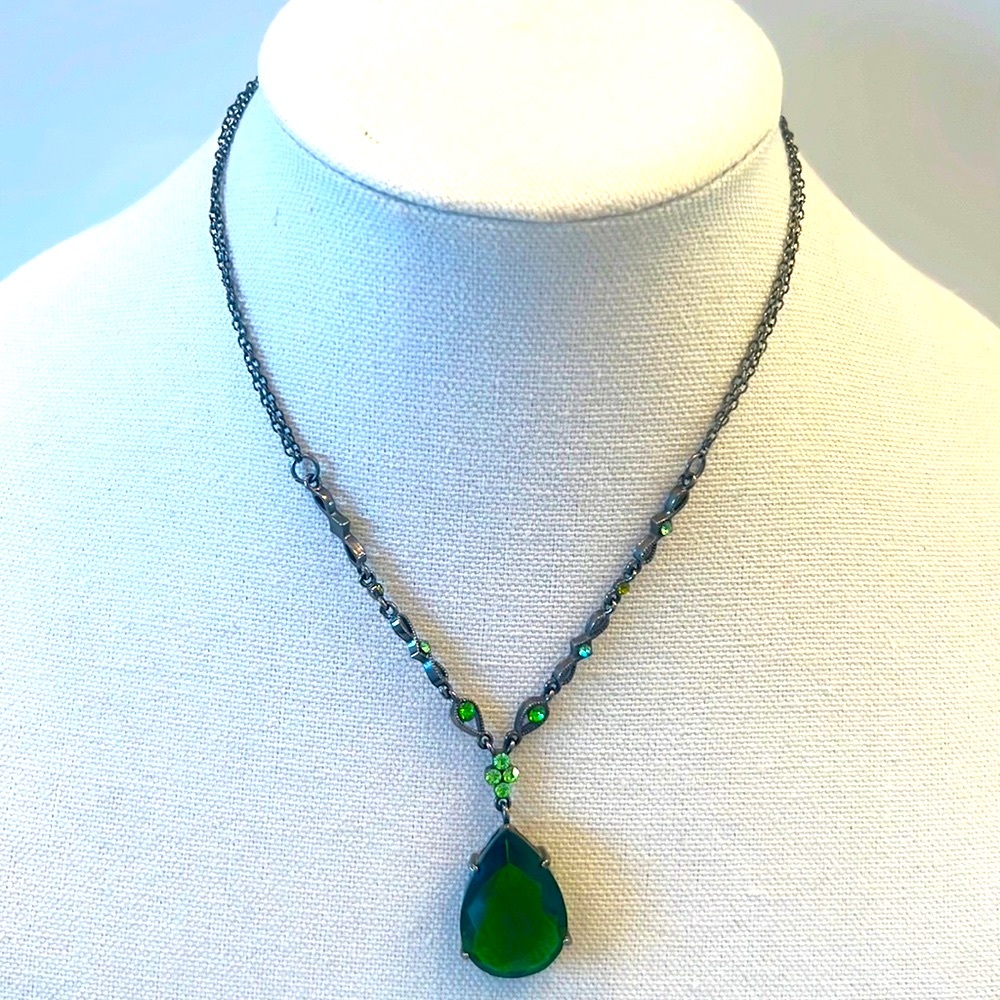 Emerald green pendant with crystal and silver chains, measures-17”.